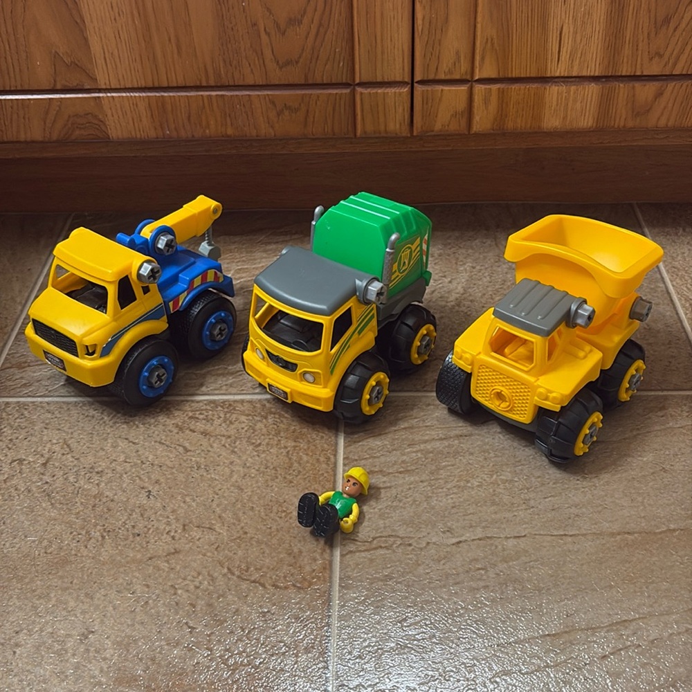 Toy trucks with interchangeable wheels